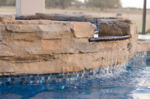 Overflowing spa into the pool, Bobco Pools in Osceola County